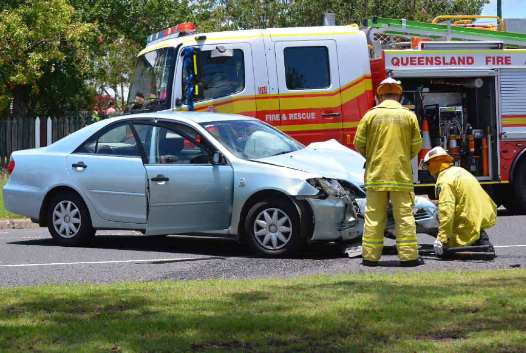BLACK SPOT: Warwick fire fighters inspect a badly damaged vehicle after an accident on the corner of Percy and Wallace Sts on Christmas Day. BLACK SPOT: Warwick fire fighters inspect a badly damaged vehicle after an accident on the corner of Percy and Wallace Sts on Christmas Day.